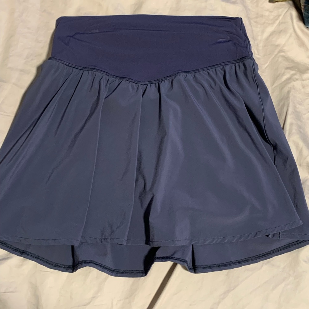 Navy/purple mix color. Tennis skirt